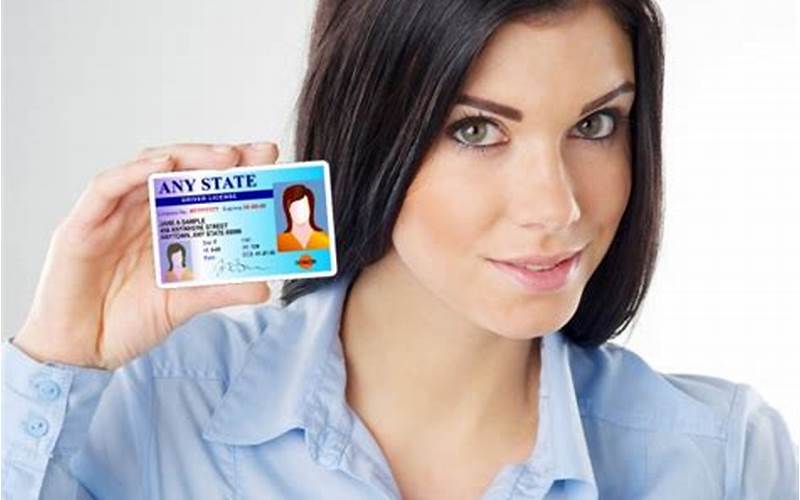Person Holding Id Card